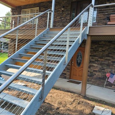 Completed yet another custom build these stairs are 6' wide Galvanized per specs build to last a life time.  Rails are our signature SS cable system with SS plate post featuring a 2 1/2" top rail all with the #4 finish.  This system provides the edge protection while allowing non obstructed views. A great system and a look that last for years!
